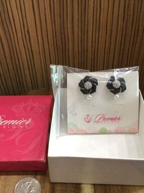 Premier Designs earrings. Two pair. New in a box.